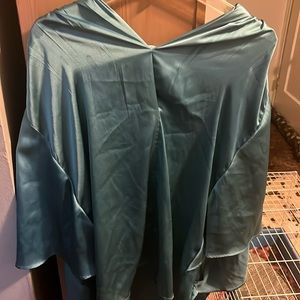 I’m selling this blue silk blouse